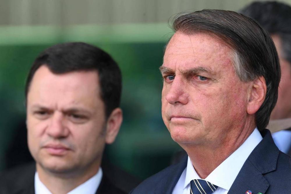 Bolsonaro e o então ministro Anderson Torres no Palácio da Alvorada - Evaristo Sa-5.out.22/AFP